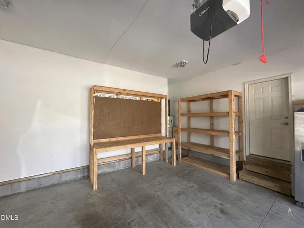 a view of a house with backyard and porch