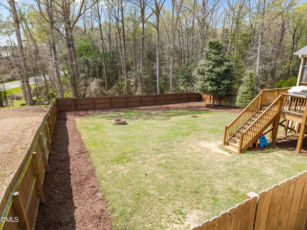 a view of swimming pool with chairs
