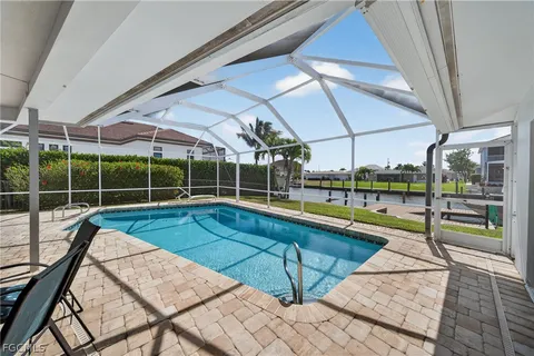$690,000 | 124 Southwest 56th Terrace, Cape Coral, FL 33914