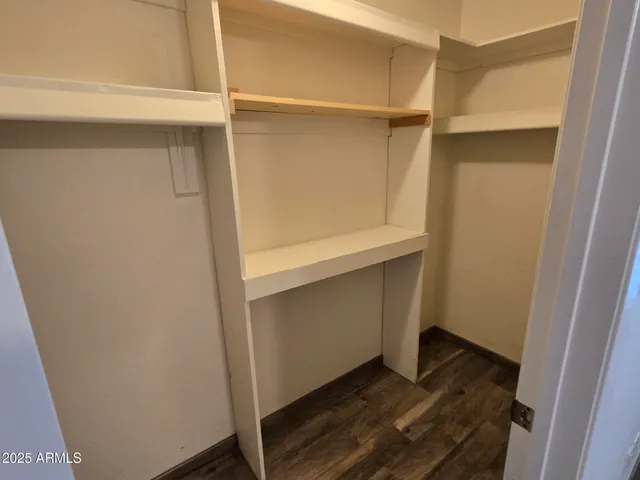 a bathroom with a shower and toilet