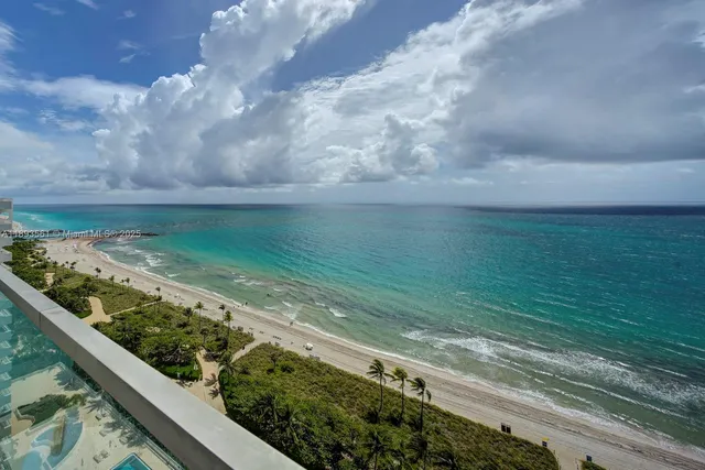 a view of a street from a balcony