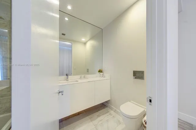 a view of a balcony with chairs