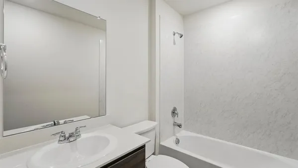 a bathroom with a sink and a bathtub