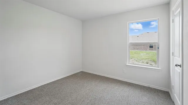 an empty room with a window