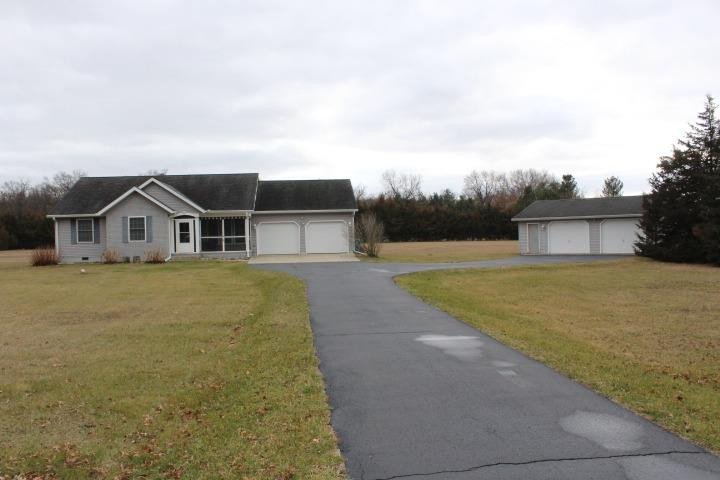2431 South Toto Road North Judson, IN 46366 - Photo 1 of 25 a house view with swimming pool in front of it
