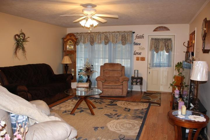 2431 South Toto Road North Judson, IN 46366 - Photo 3 of 25 a living room with furniture and wooden floor