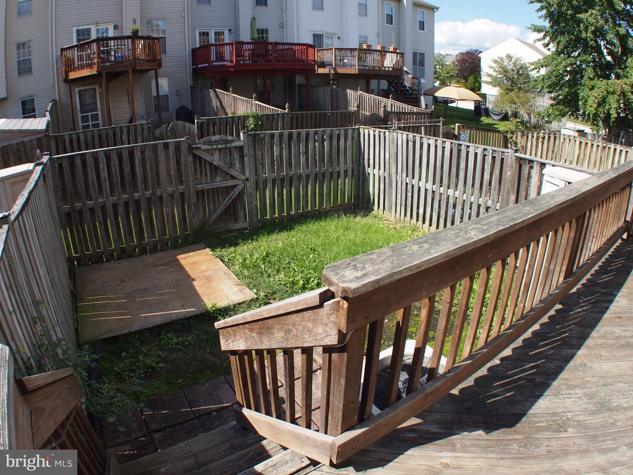 5307 Hollowstone Circle Rosedale, MD 21237 - Photo 17 of 22 a view of balcony with wooden floor