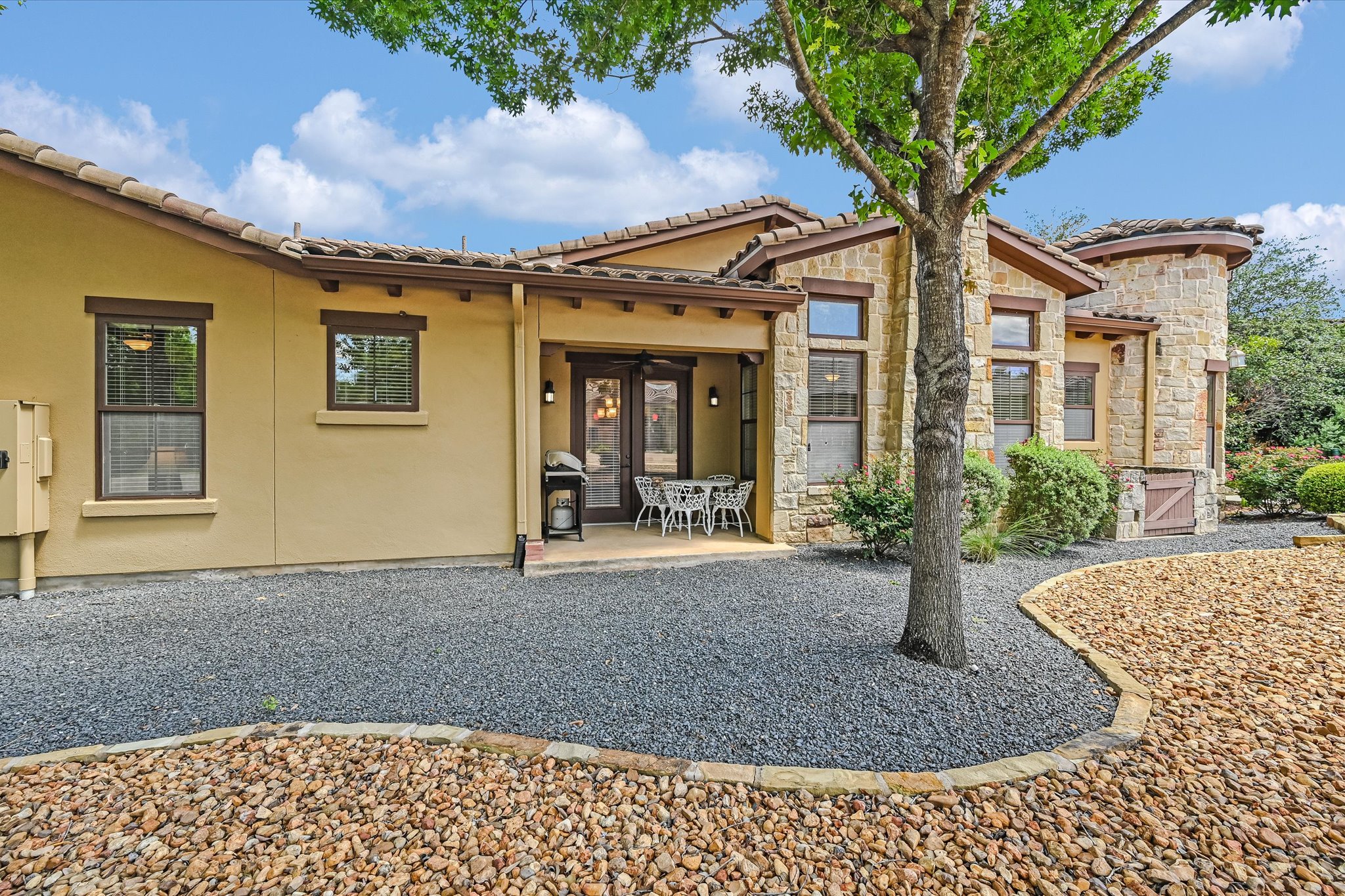 103 Rivalto Circle, Unit 1 Lakeway, TX 78734 - Photo 18 of 34 Yard area and patio