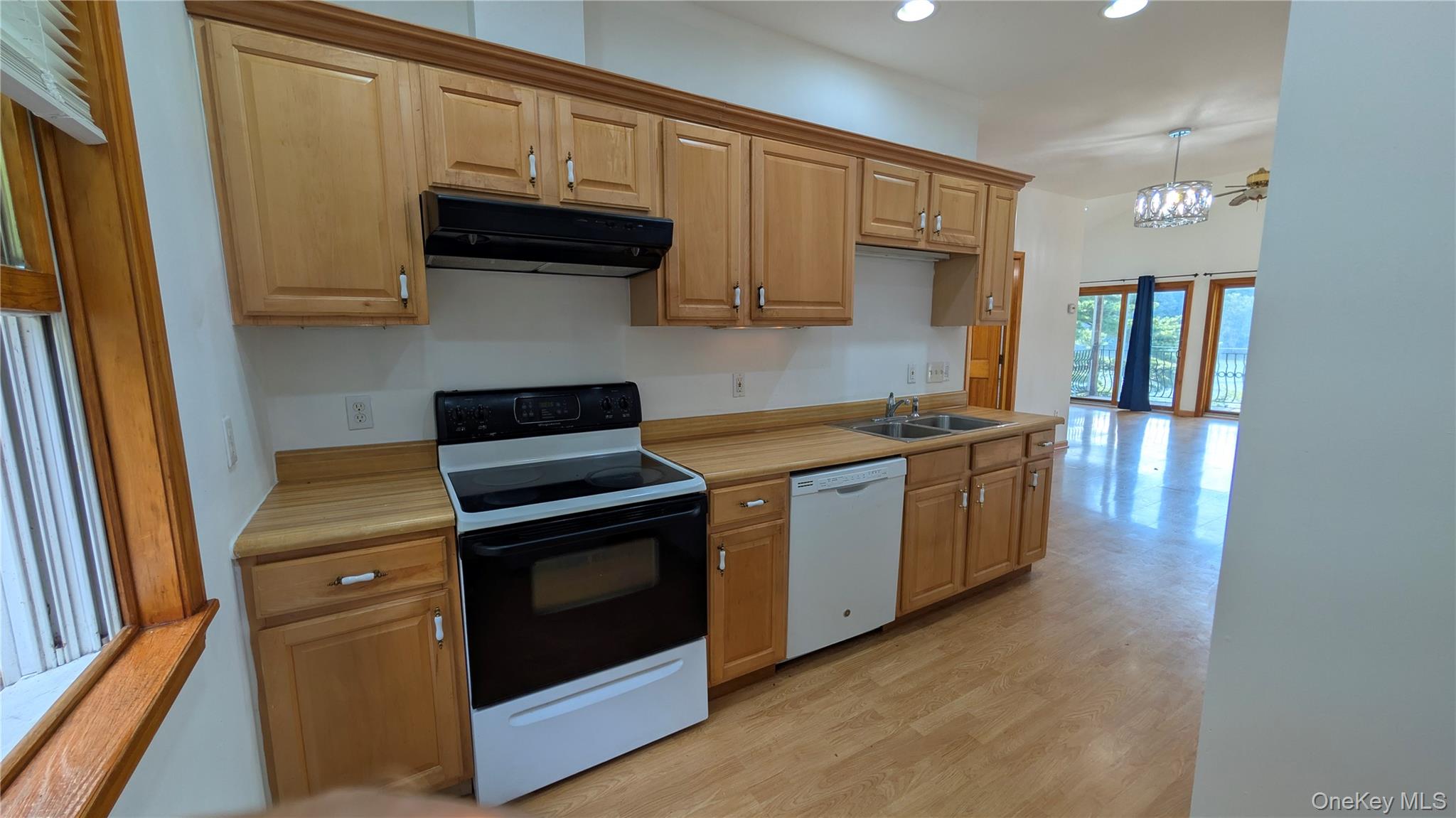 169 Shear Hill Road Mahopac, NY 10541 - Photo 17 of 31 Kitchen featuring black electric range oven, recessed lighting, light countertops, range hood, and dishwasher