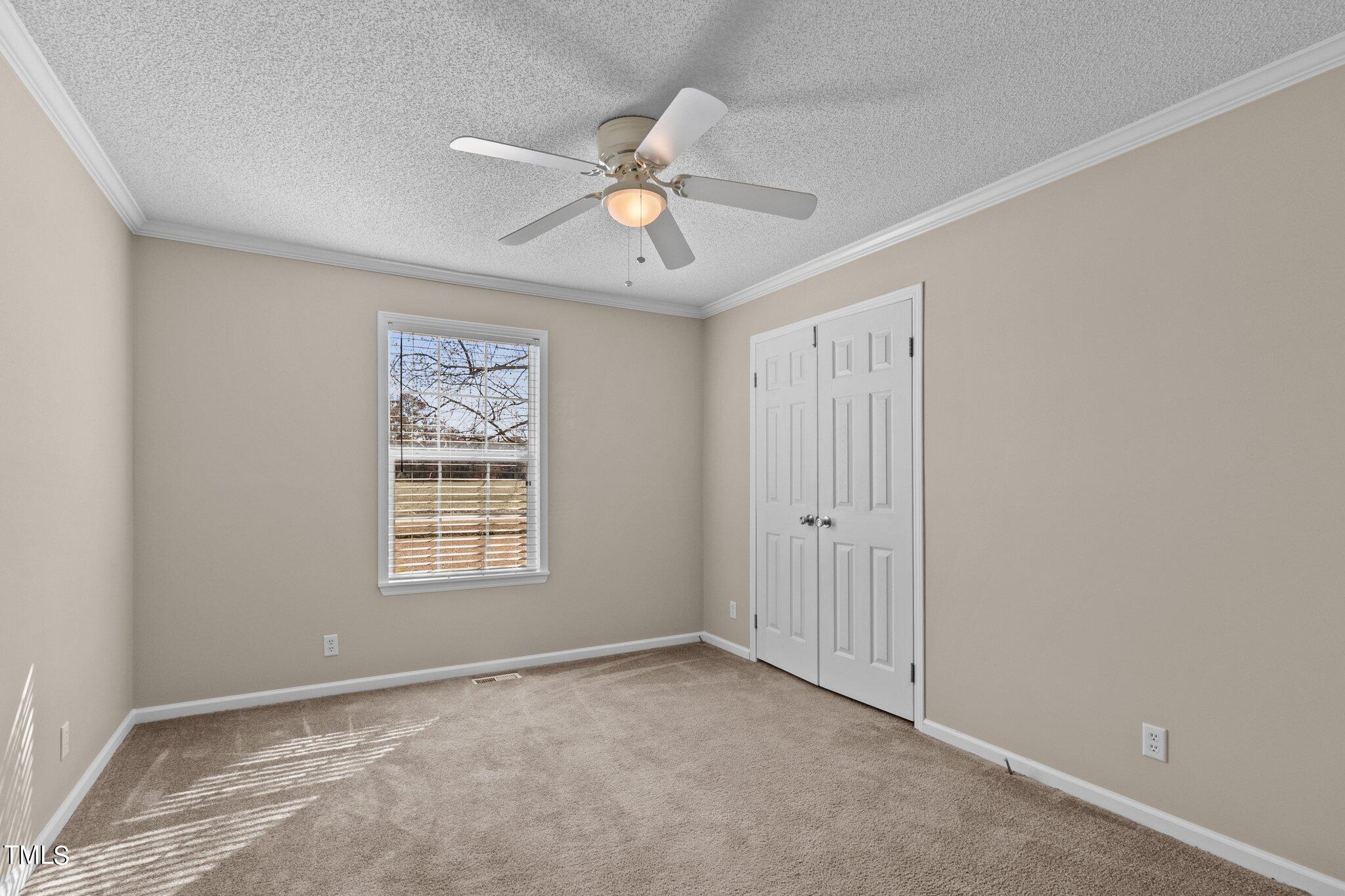 7929 Keener Road Clinton, NC 28328 - Photo 19 of 36 a view of an empty room with a window