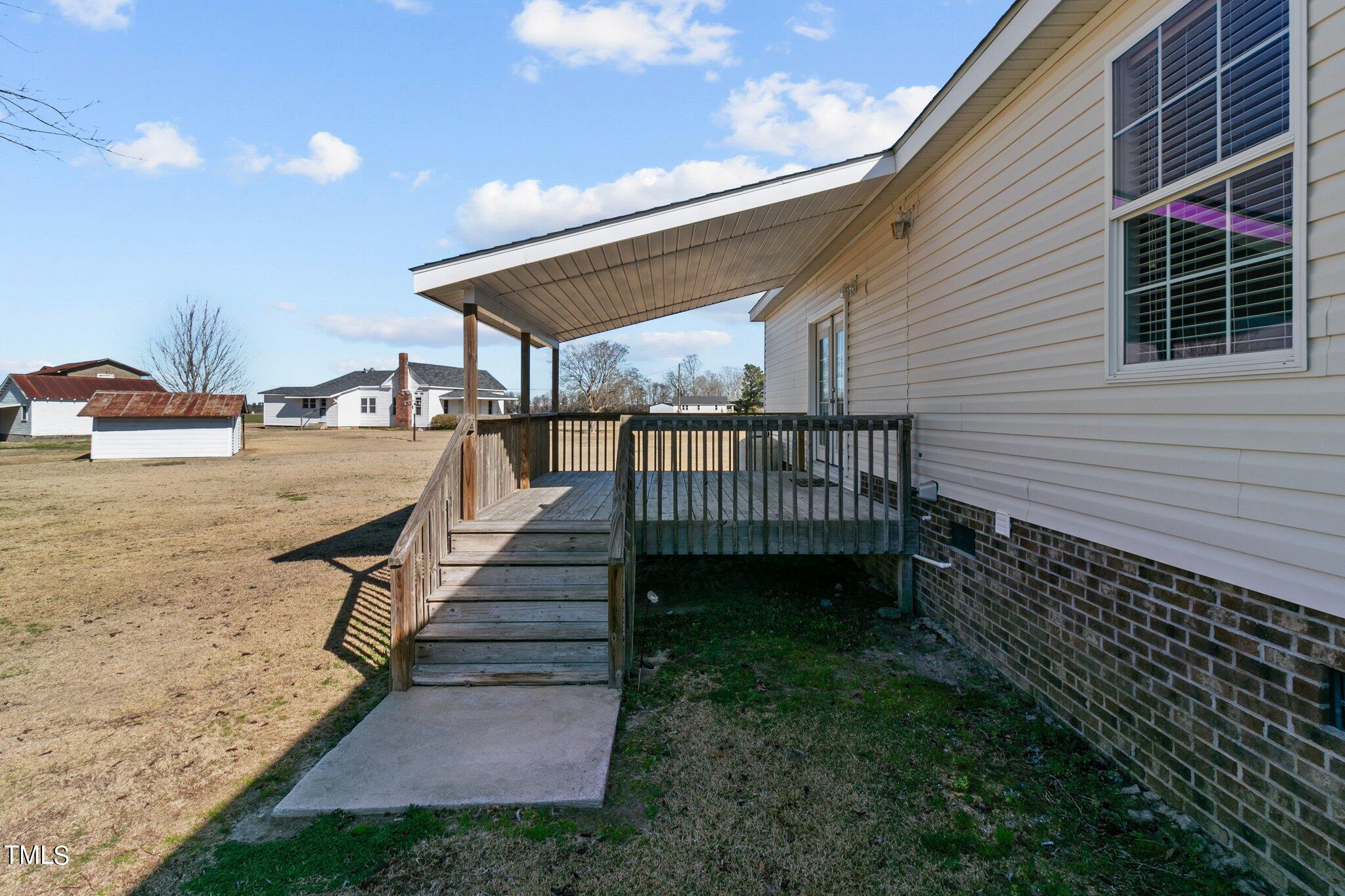 7929 Keener Road Clinton, NC 28328 - Photo 36 of 36 a view of a backyard with sitting area
