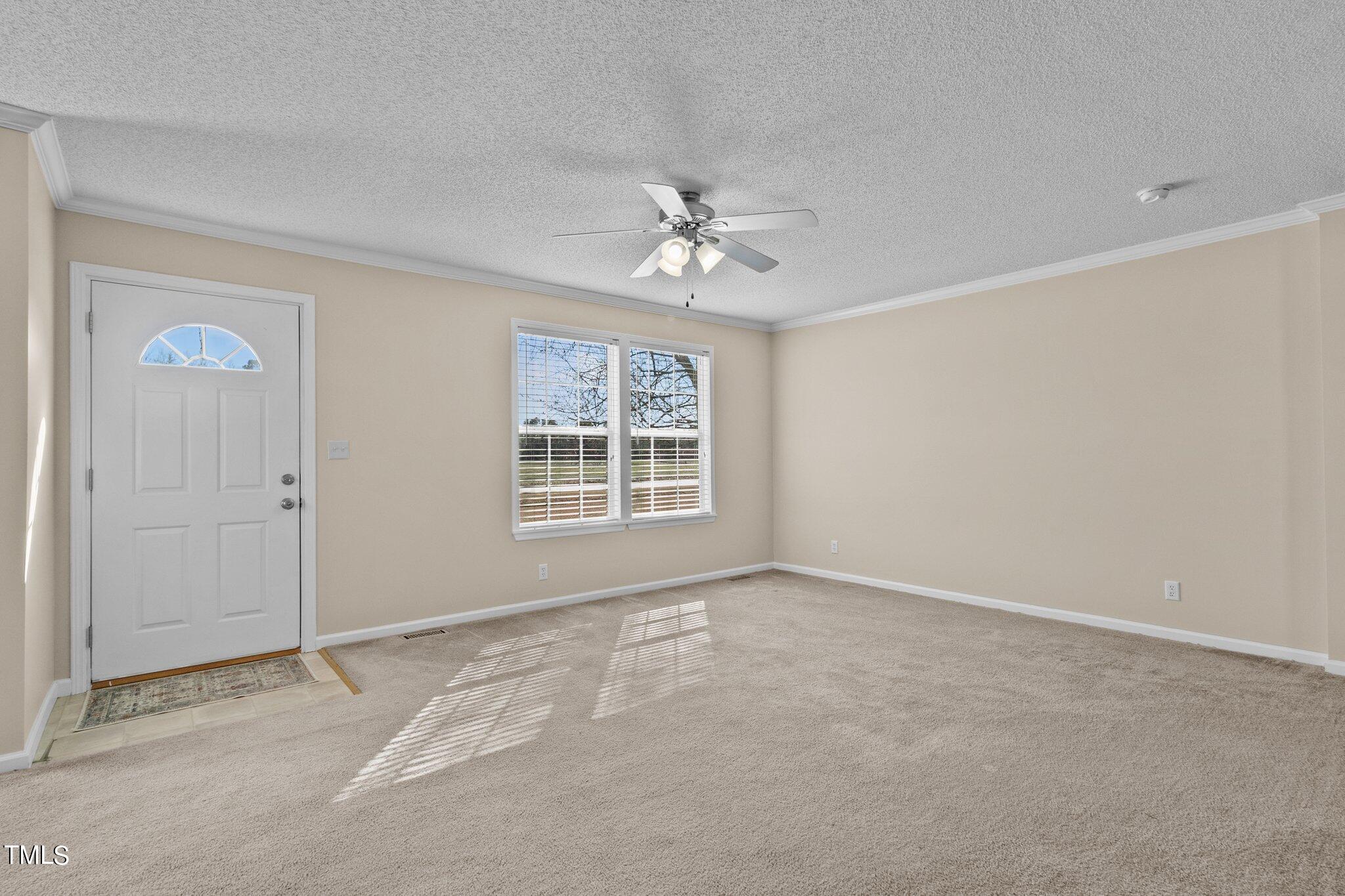 7929 Keener Road Clinton, NC 28328 - Photo 5 of 36 a view of an empty room with a window