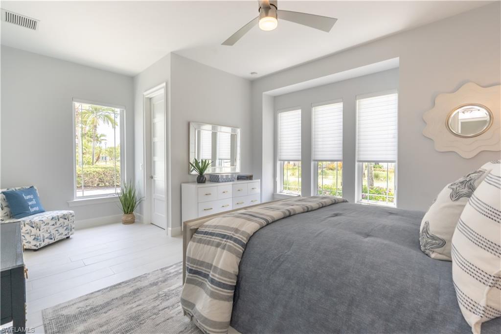 5060 Martinique Drive Naples, FL 34113 - Photo 37 of 49 Large windows bring in abundanty sushine.