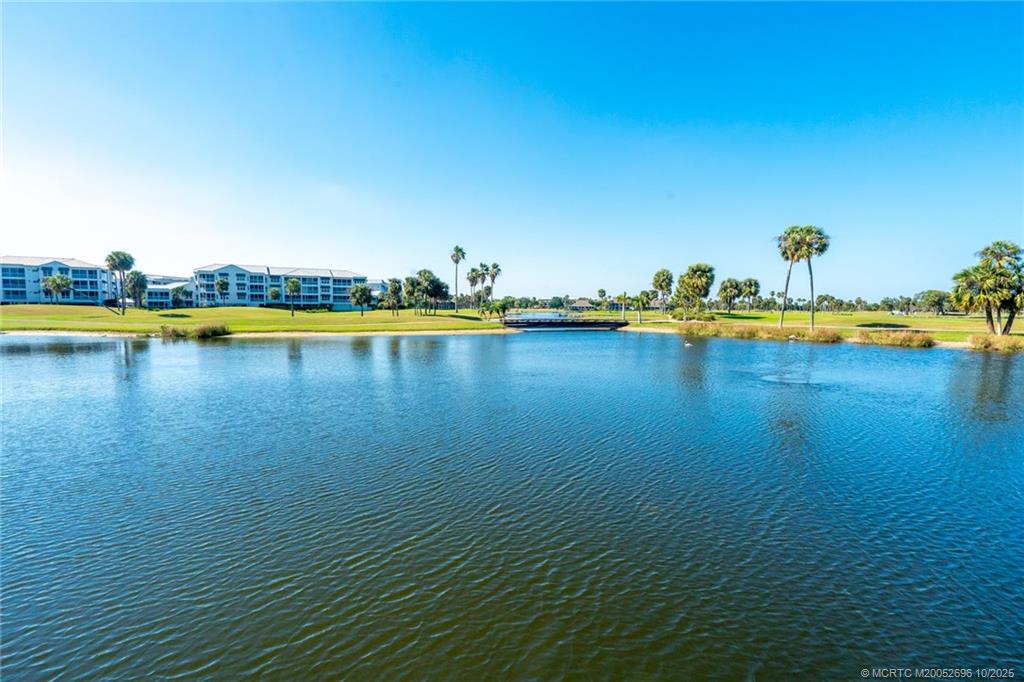 40 Northeast Plantation Road, Unit 203 Jensen Beach, FL 34957 - Photo 36 of 53 a view of a pool and an outdoor space
