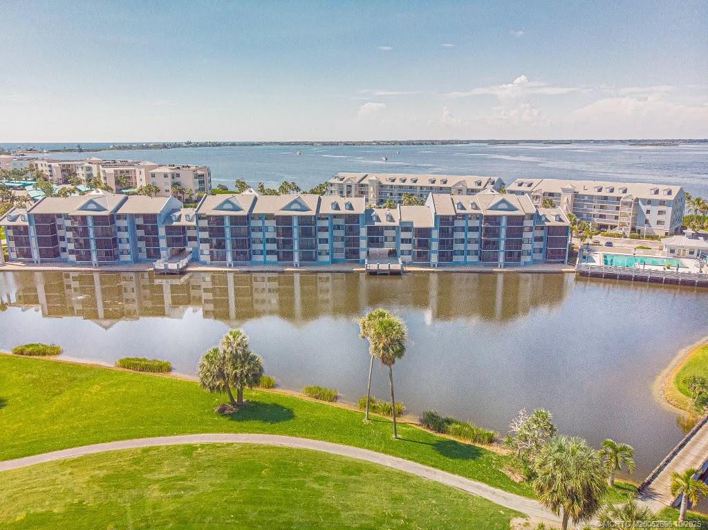 40 Northeast Plantation Road, Unit 203 Jensen Beach, FL 34957 - Photo 44 of 53 a view of a city with a lake view
