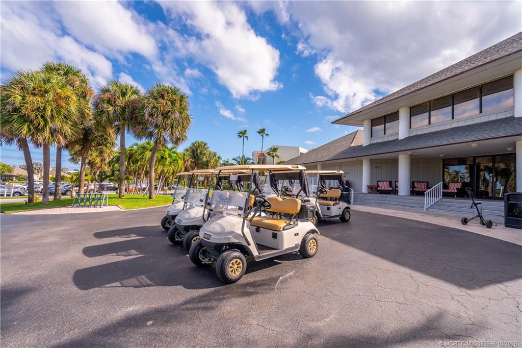 40 Northeast Plantation Road, Unit 203 Jensen Beach, FL 34957 - Photo 53 of 53 a view of a street with cars