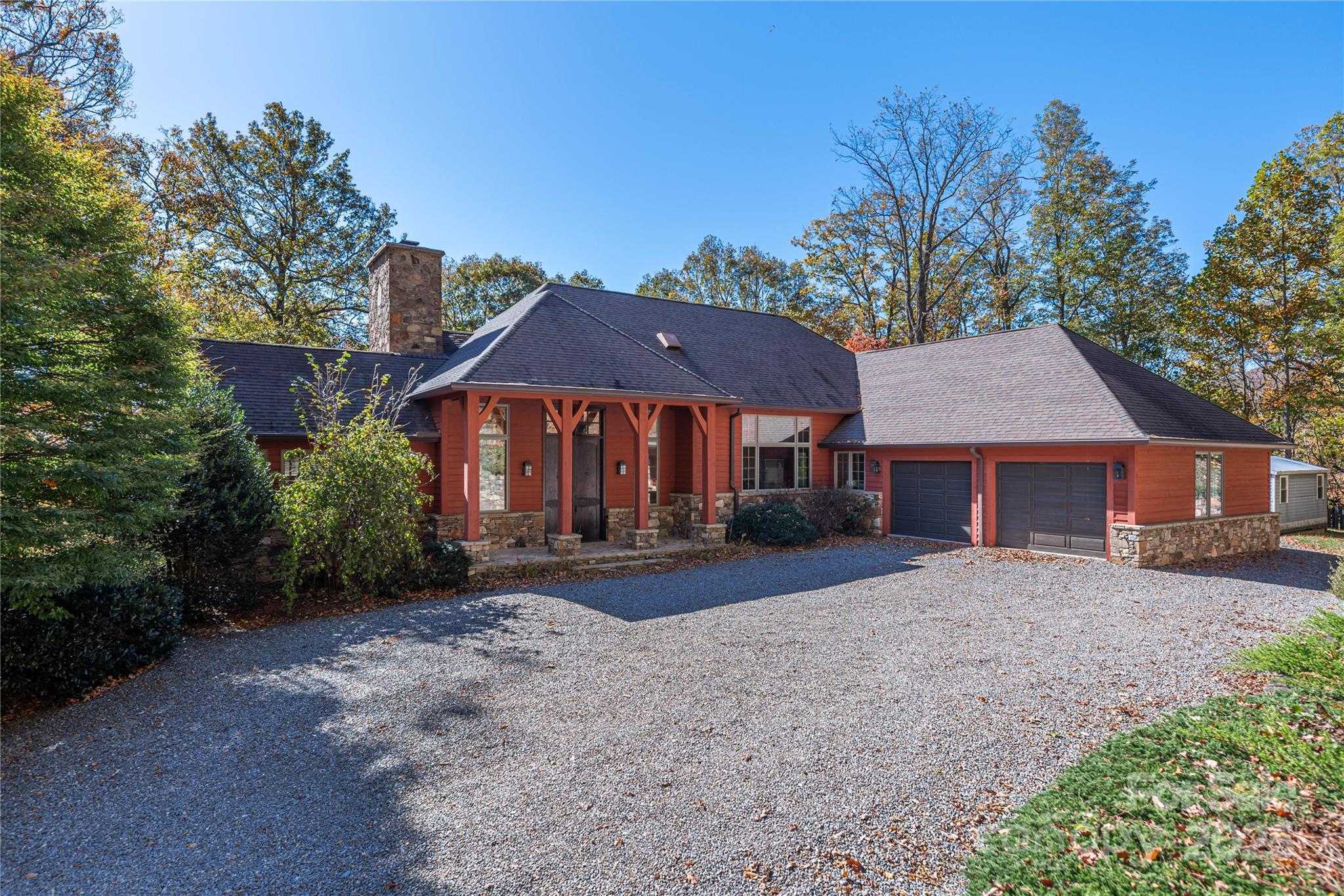 98 Flat Creek Road Fairview, NC 28730 - Photo 1 of 47 a front view of a house with yard patio and green space