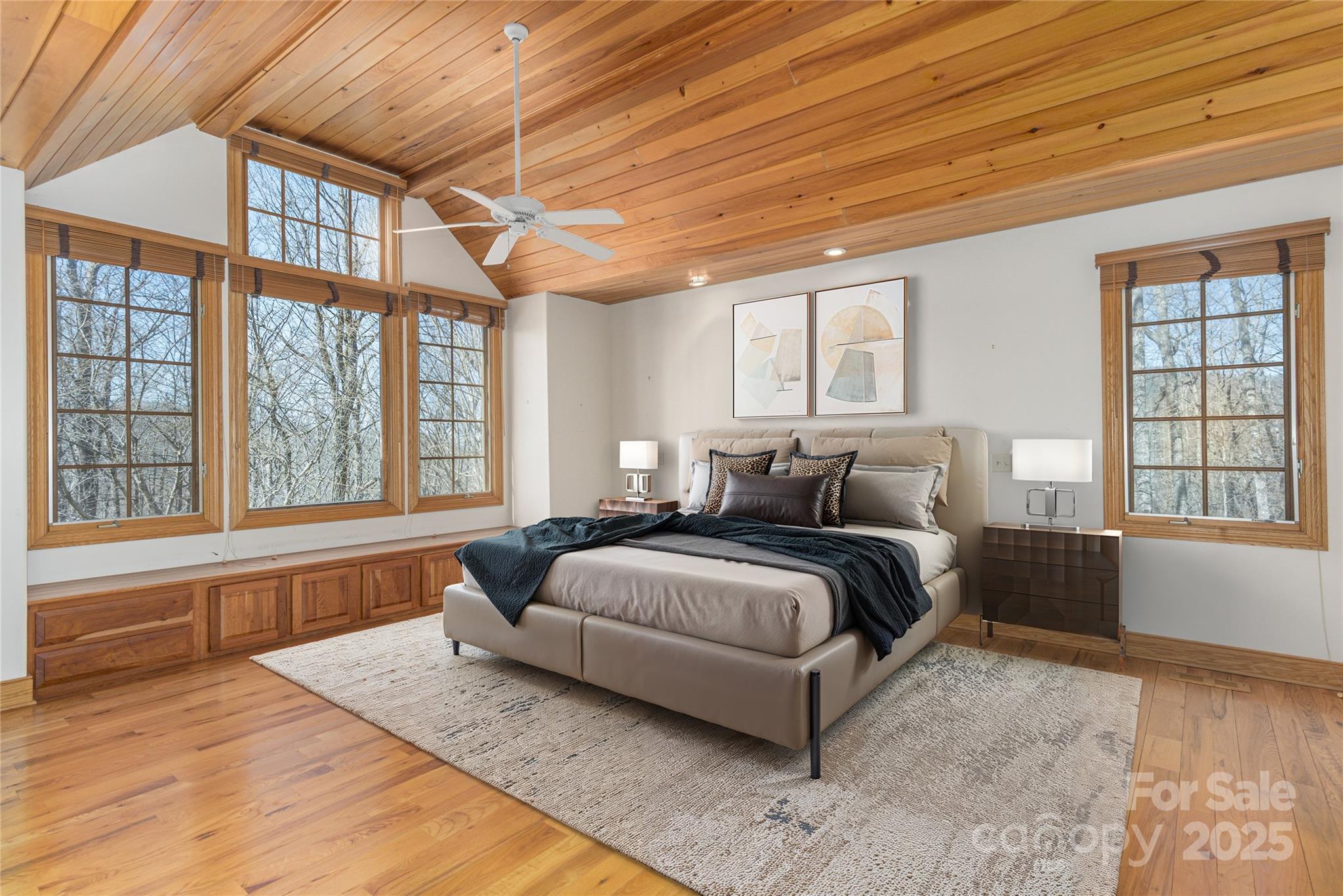 98 Flat Creek Road Fairview, NC 28730 - Photo 19 of 47 a spacious bedroom with a bed and a large window