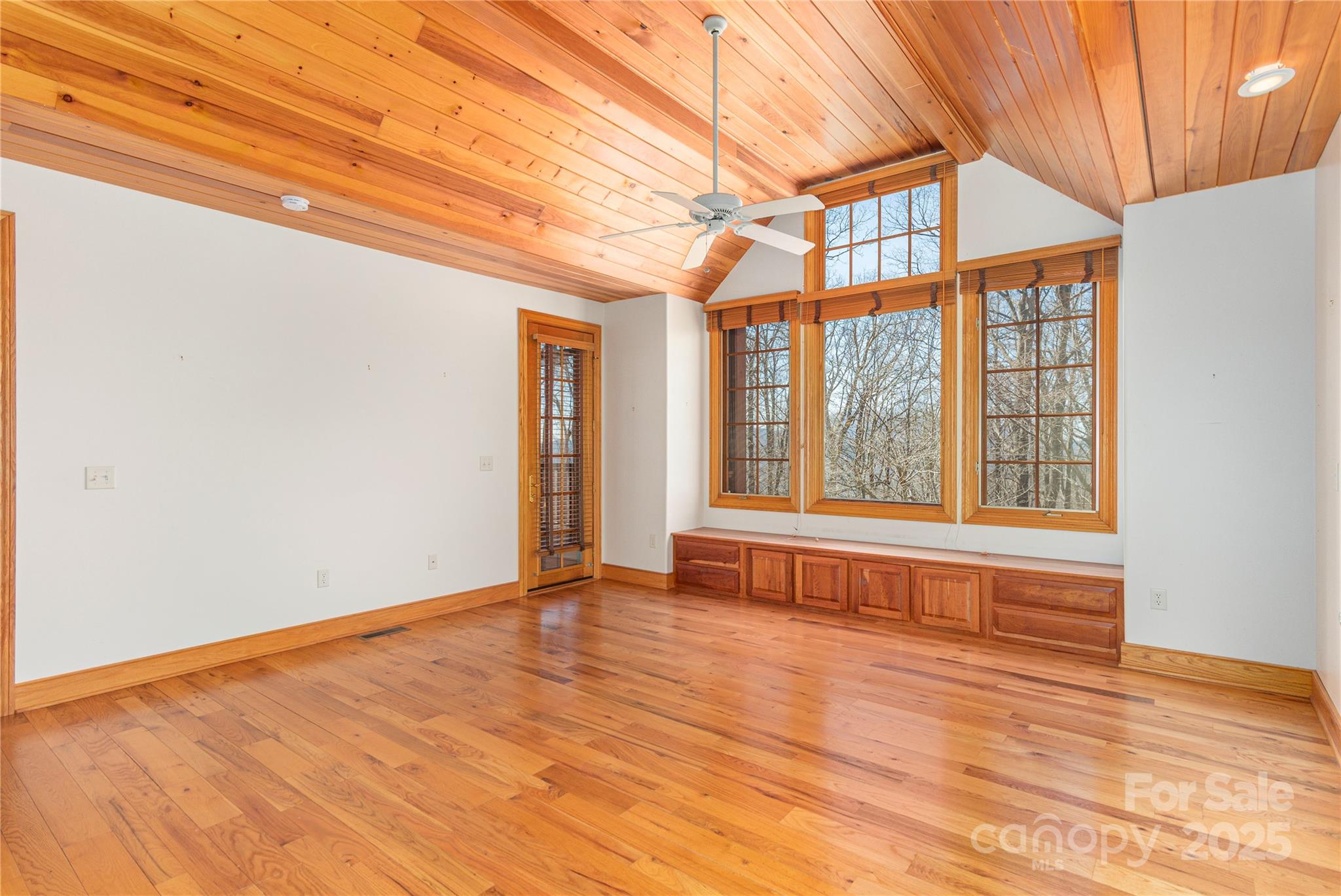 98 Flat Creek Road Fairview, NC 28730 - Photo 20 of 47 a view of an empty room with a window