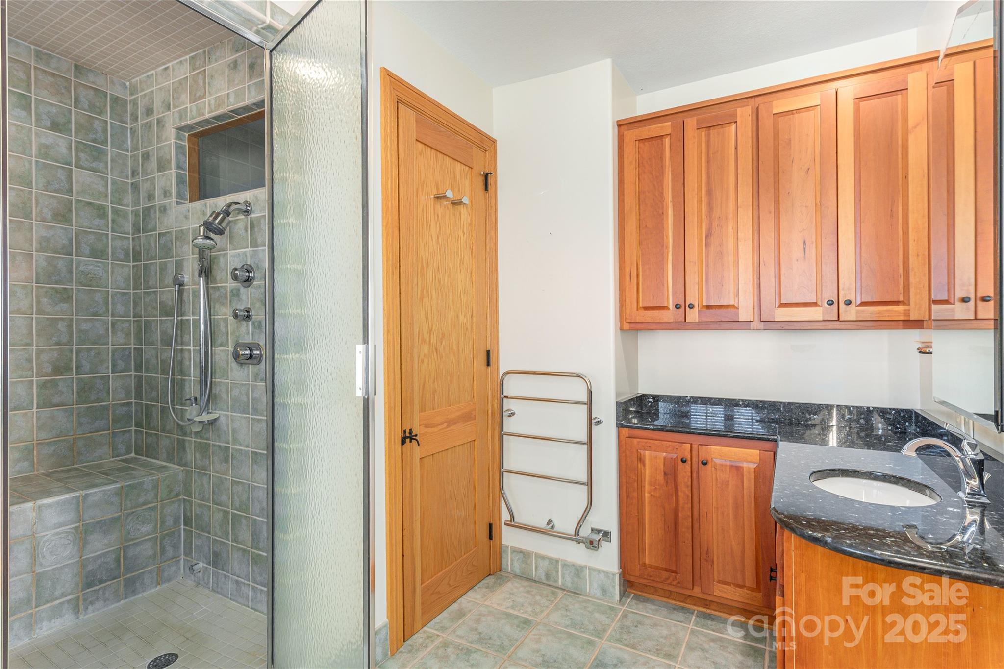 98 Flat Creek Road Fairview, NC 28730 - Photo 22 of 47 a bathroom with a sink and a shower