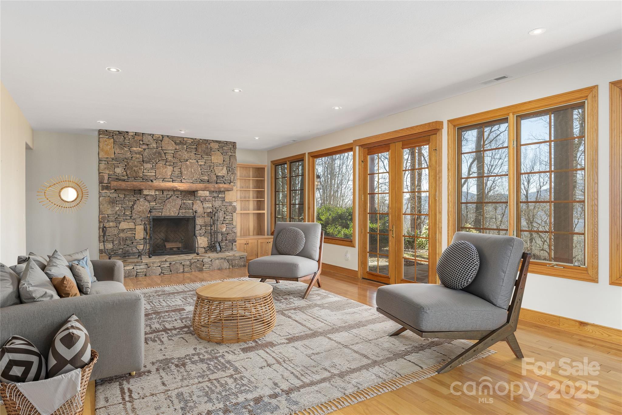 98 Flat Creek Road Fairview, NC 28730 - Photo 24 of 47 a living room with furniture and a large window