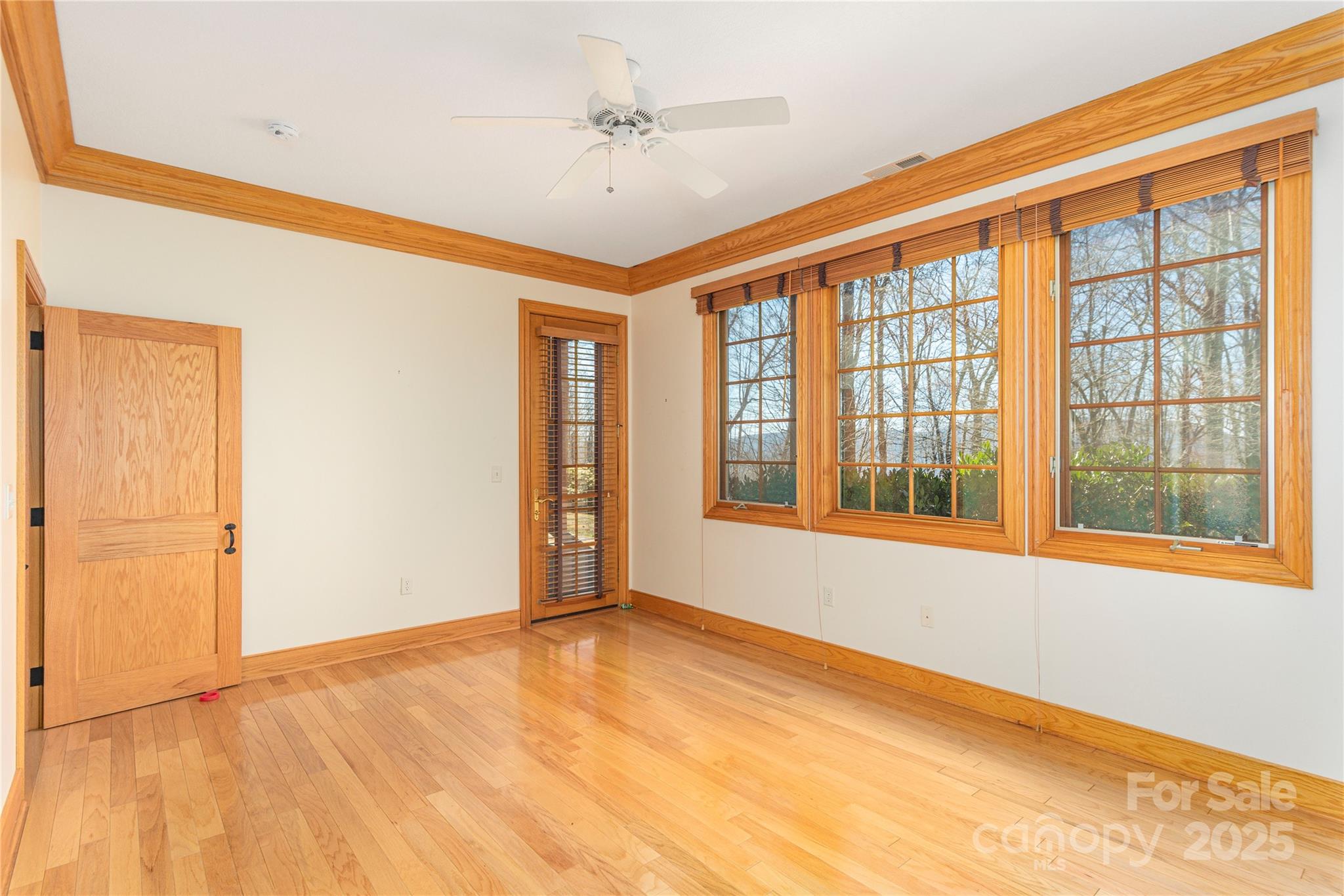 98 Flat Creek Road Fairview, NC 28730 - Photo 30 of 47 a view of an empty room with a window