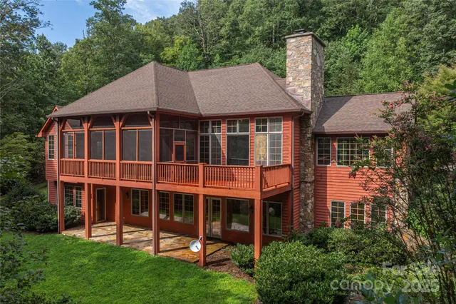 a front view of a building with a garden