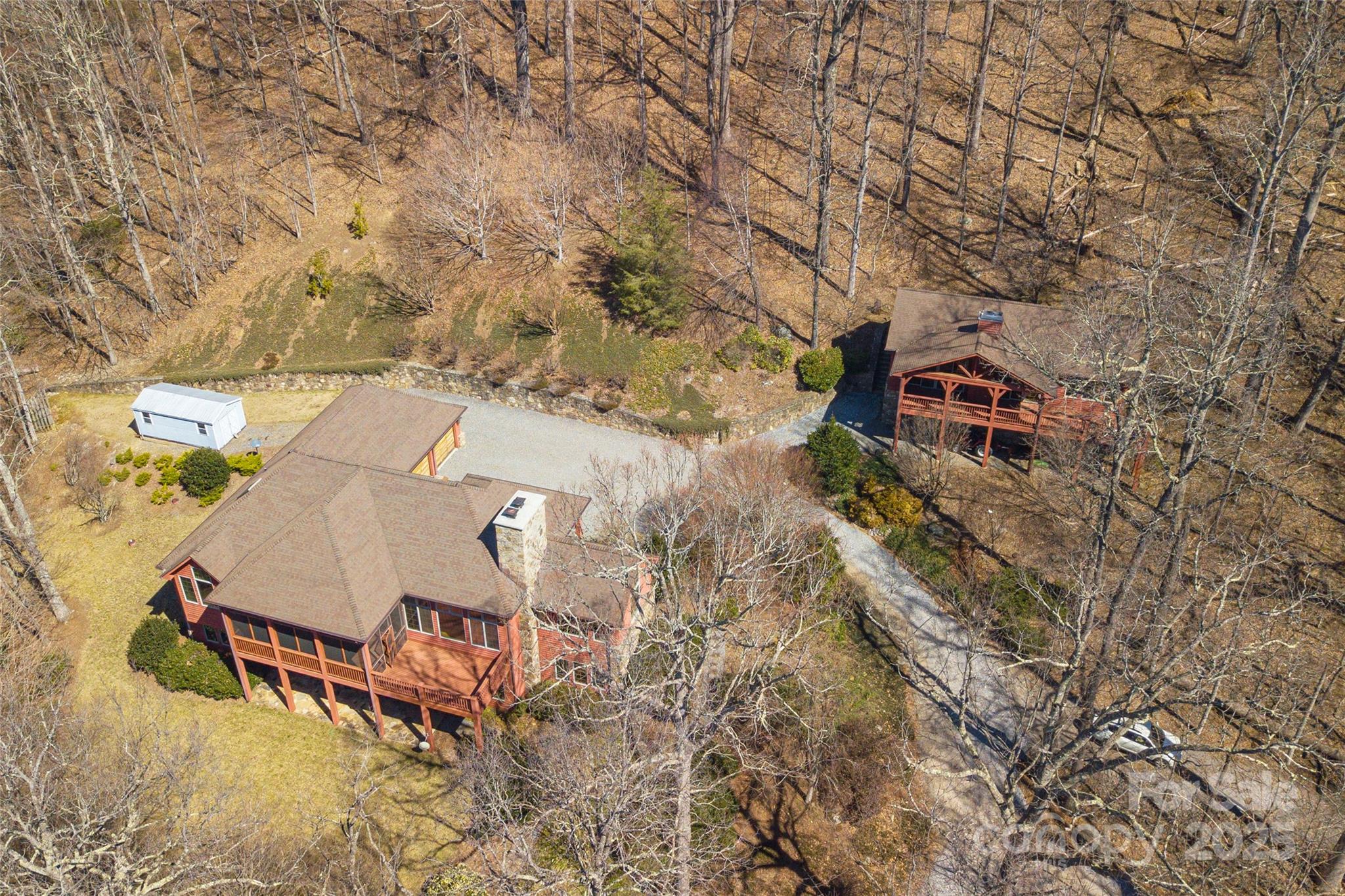98 Flat Creek Road Fairview, NC 28730 - Photo 41 of 47 an aerial view of a house with a yard