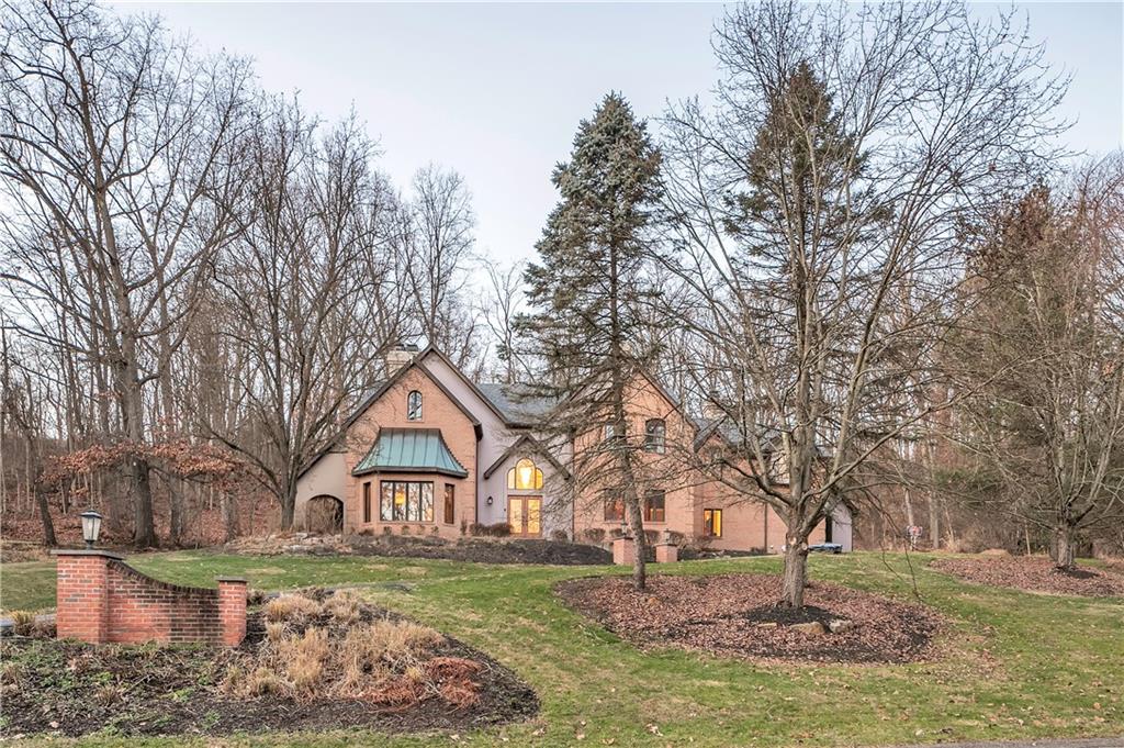 a house with trees in the back yard