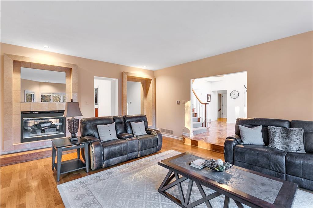413 Windmere Drive Pittsburgh, PA 15238 - Photo 12 of 50 a living room with furniture and a fireplace
