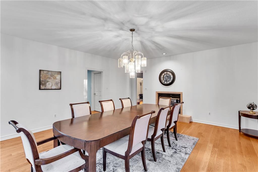 413 Windmere Drive Pittsburgh, PA 15238 - Photo 15 of 50 a view of a dining room with furniture a chandelier and wooden floor
