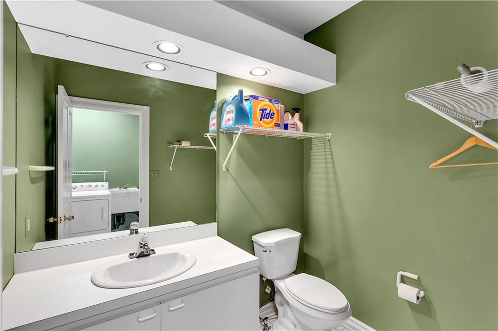 413 Windmere Drive Pittsburgh, PA 15238 - Photo 29 of 50 a bathroom with a sink mirror vanity and toilet