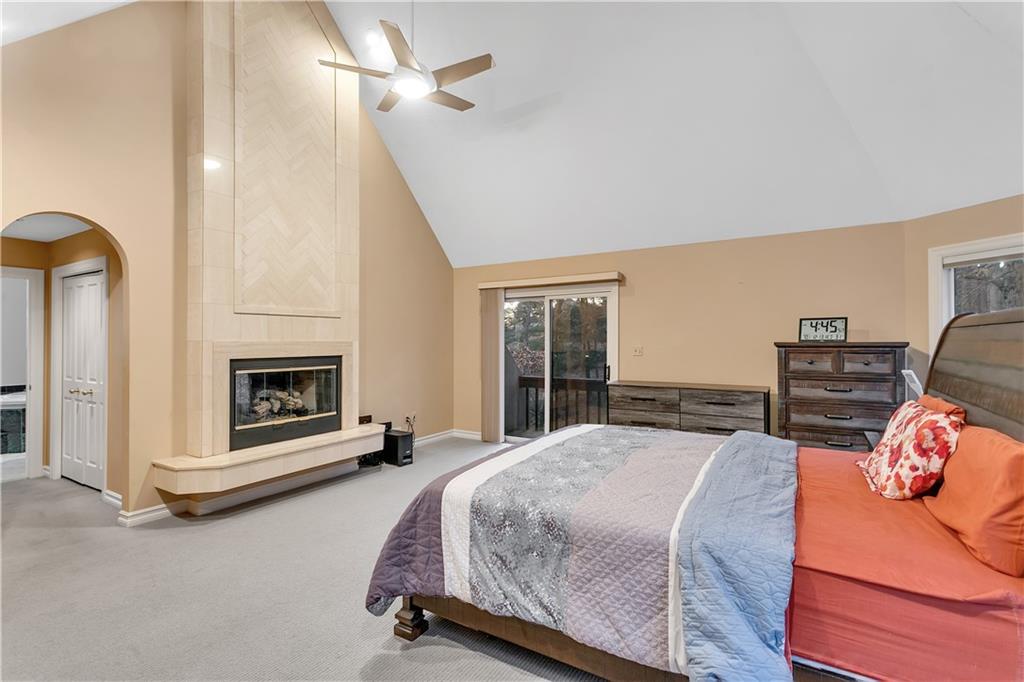 413 Windmere Drive Pittsburgh, PA 15238 - Photo 34 of 50 a bedroom with a bed and a fireplace