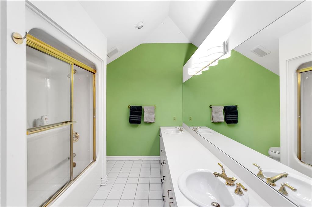 413 Windmere Drive Pittsburgh, PA 15238 - Photo 42 of 50 a bathroom with a sink and a mirror