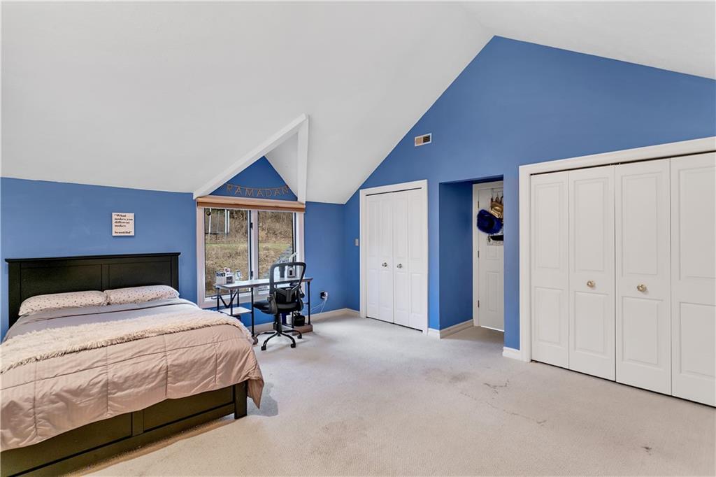 413 Windmere Drive Pittsburgh, PA 15238 - Photo 43 of 50 a bedroom with a bed and a large window