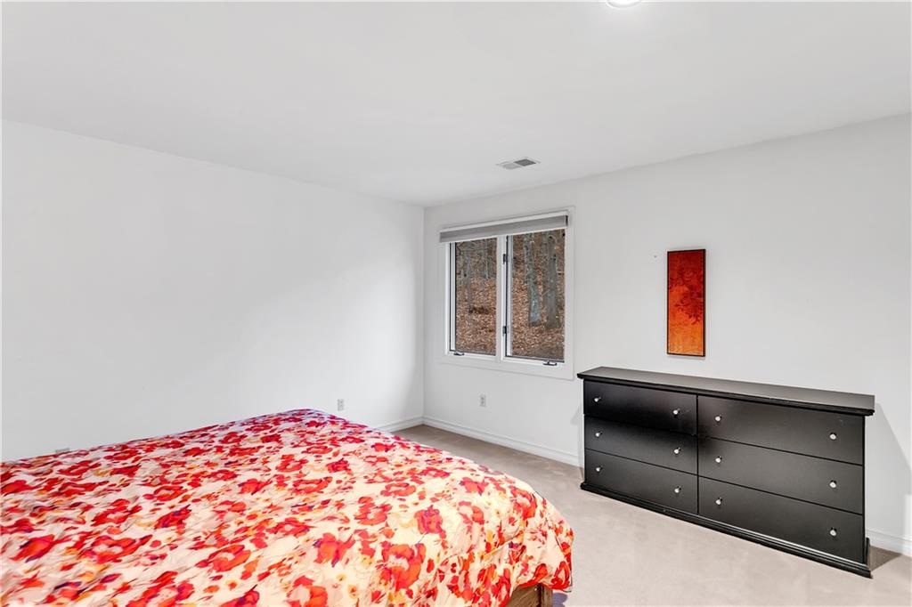 413 Windmere Drive Pittsburgh, PA 15238 - Photo 44 of 50 a bedroom with a bed and a window