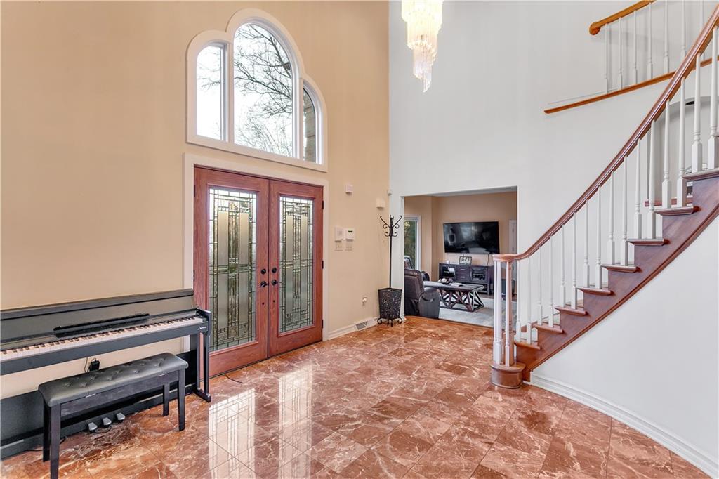 413 Windmere Drive Pittsburgh, PA 15238 - Photo 10 of 50 a view of a livingroom with furniture and staircase