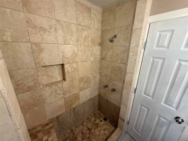 a bathroom with a shower