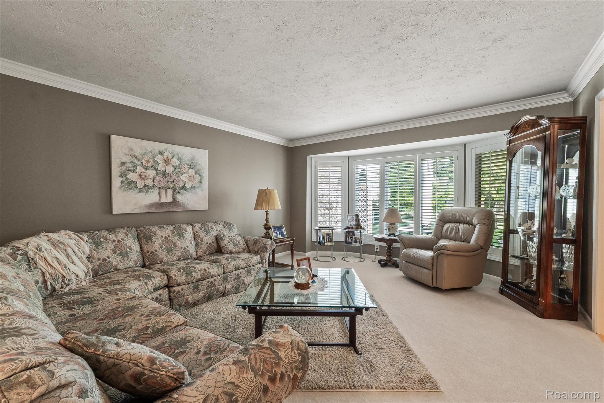 1662 Sumac Drive Rochester, MI 48309 - Photo 6 of 38 Living area featuring light-toned carpeting and neutral wall paint