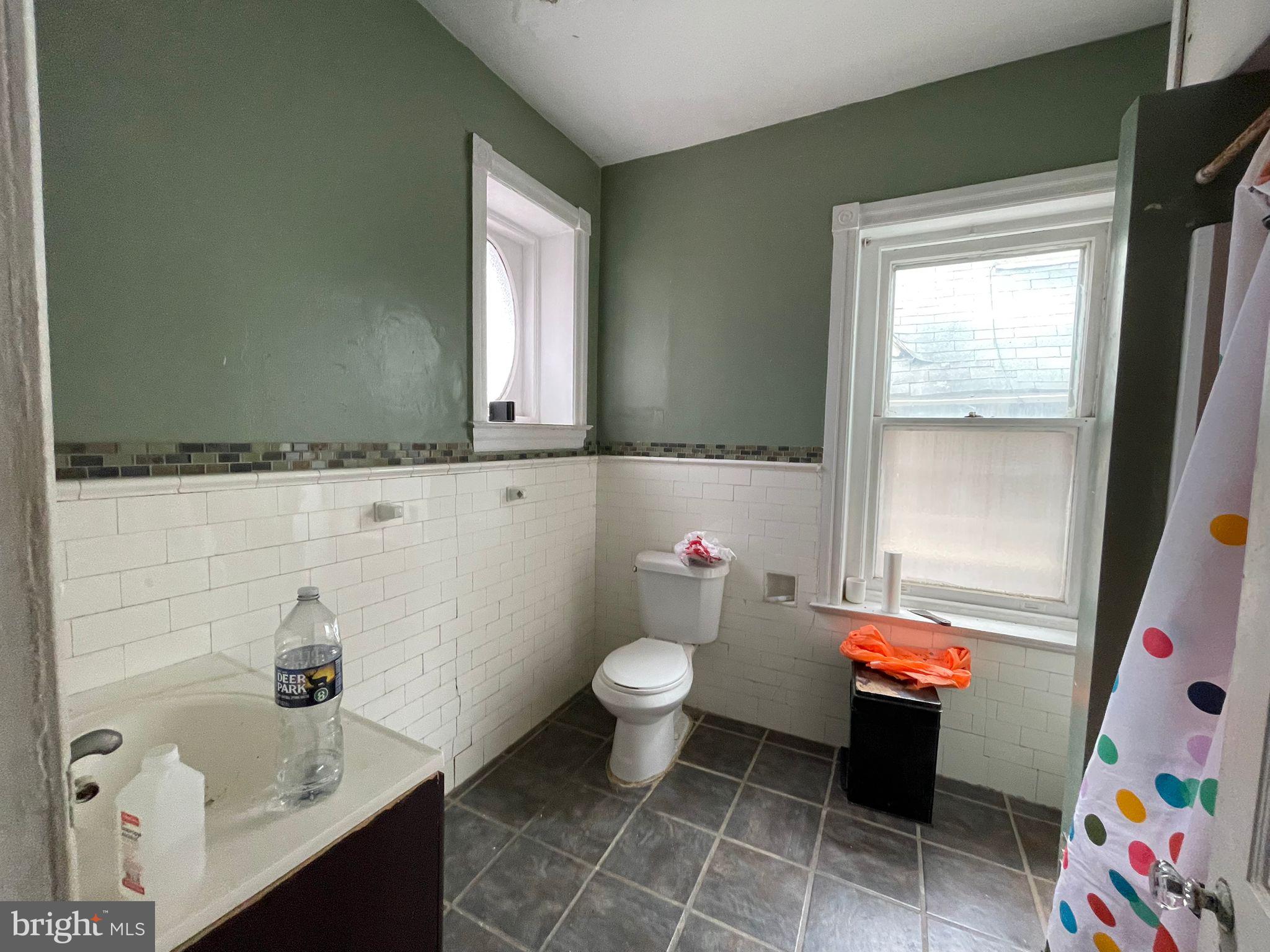 5809 Chew Avenue Philadelphia, PA 19138 - Photo 14 of 29 a bathroom with a sink toilet and shower