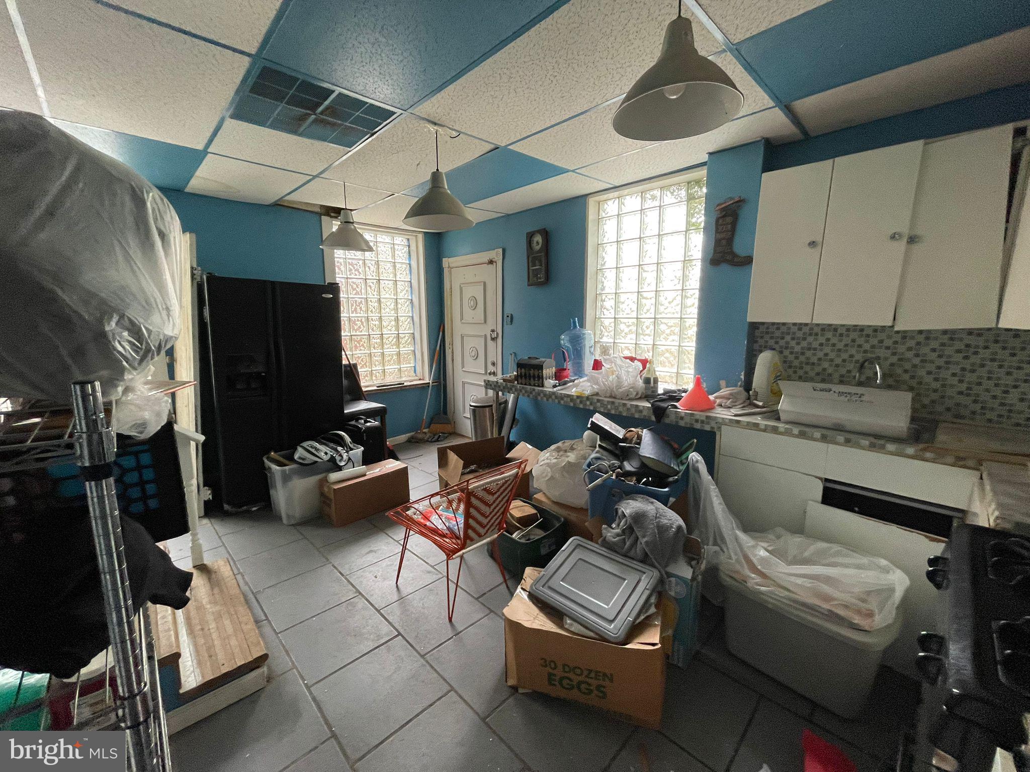 5809 Chew Avenue Philadelphia, PA 19138 - Photo 5 of 29 a living room with furniture and a fireplace