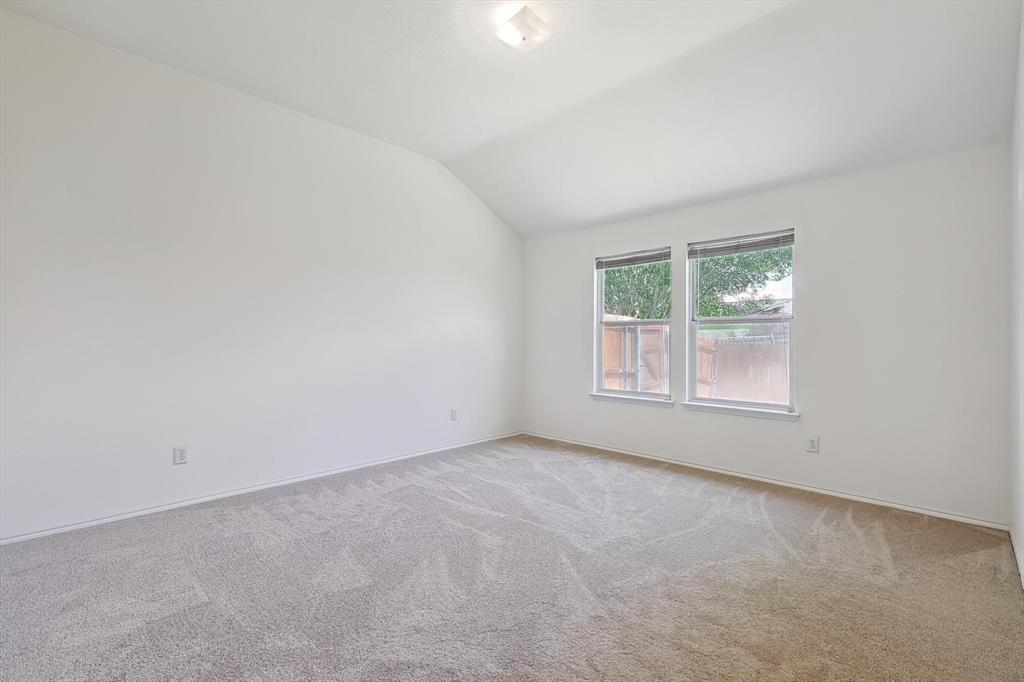 5424 Elk Ridge Drive Watauga, TX 76137 - Photo 19 of 40 an empty room with windows