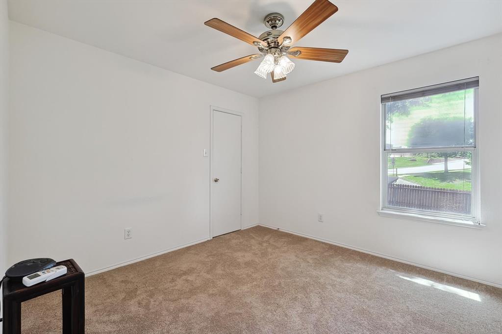 5424 Elk Ridge Drive Watauga, TX 76137 - Photo 29 of 40 an empty room with a window