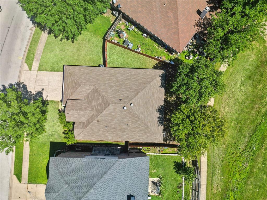5424 Elk Ridge Drive Watauga, TX 76137 - Photo 38 of 40 an aerial view of a house with a yard