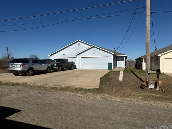 a car parked in front of a house