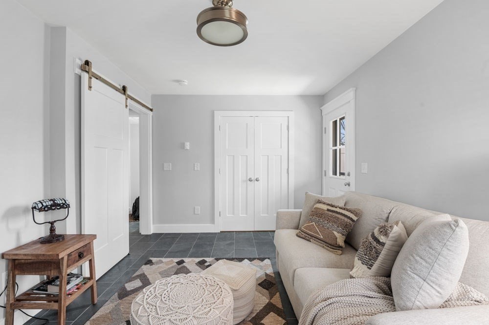 21 Hines Way, Unit 21 Newburyport, MA 01950 - Photo 18 of 21 a living room with furniture