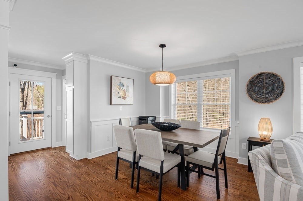 21 Hines Way, Unit 21 Newburyport, MA 01950 - Photo 6 of 21 a view of a dining room with furniture window and wooden floor