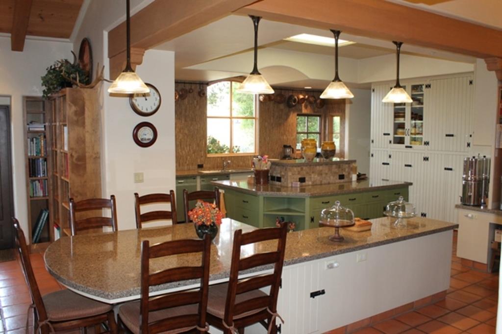 30100 Chualar Canyon Road Chualar, CA 93925 - Photo 5 of 20 a room with dining table and chairs