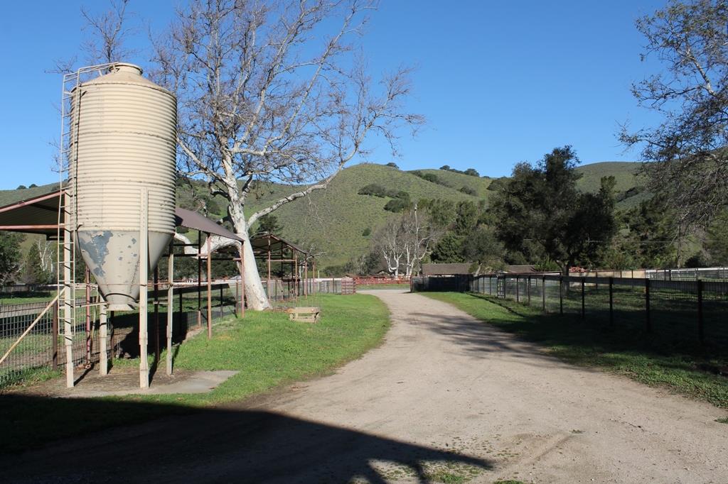 30100 Chualar Canyon Road Chualar, CA 93925 - Photo 9 of 20 a view of a garden with a bench in the patio