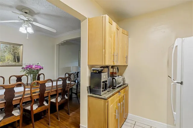 a very nice looking dining room with a dining table and chairs
